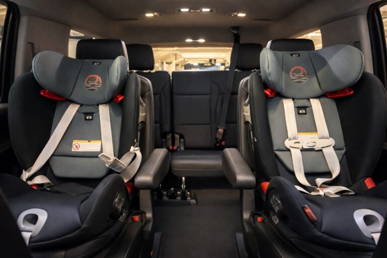 Luxury SUV interior with child car seats for private Disney airport transportation