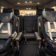 Luxury SUV interior with child car seats for private Disney airport transportation