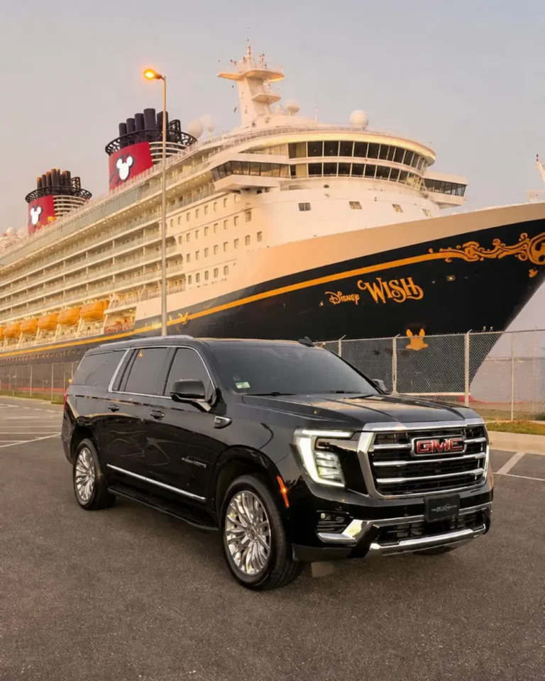 Black Chevrolet Suburban parked in front of a Disney cruise ship at Port Canaveral for private transportation service.